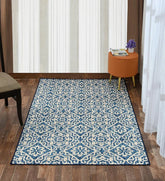 Geometric patterned blue and ivory Moroccan rug.